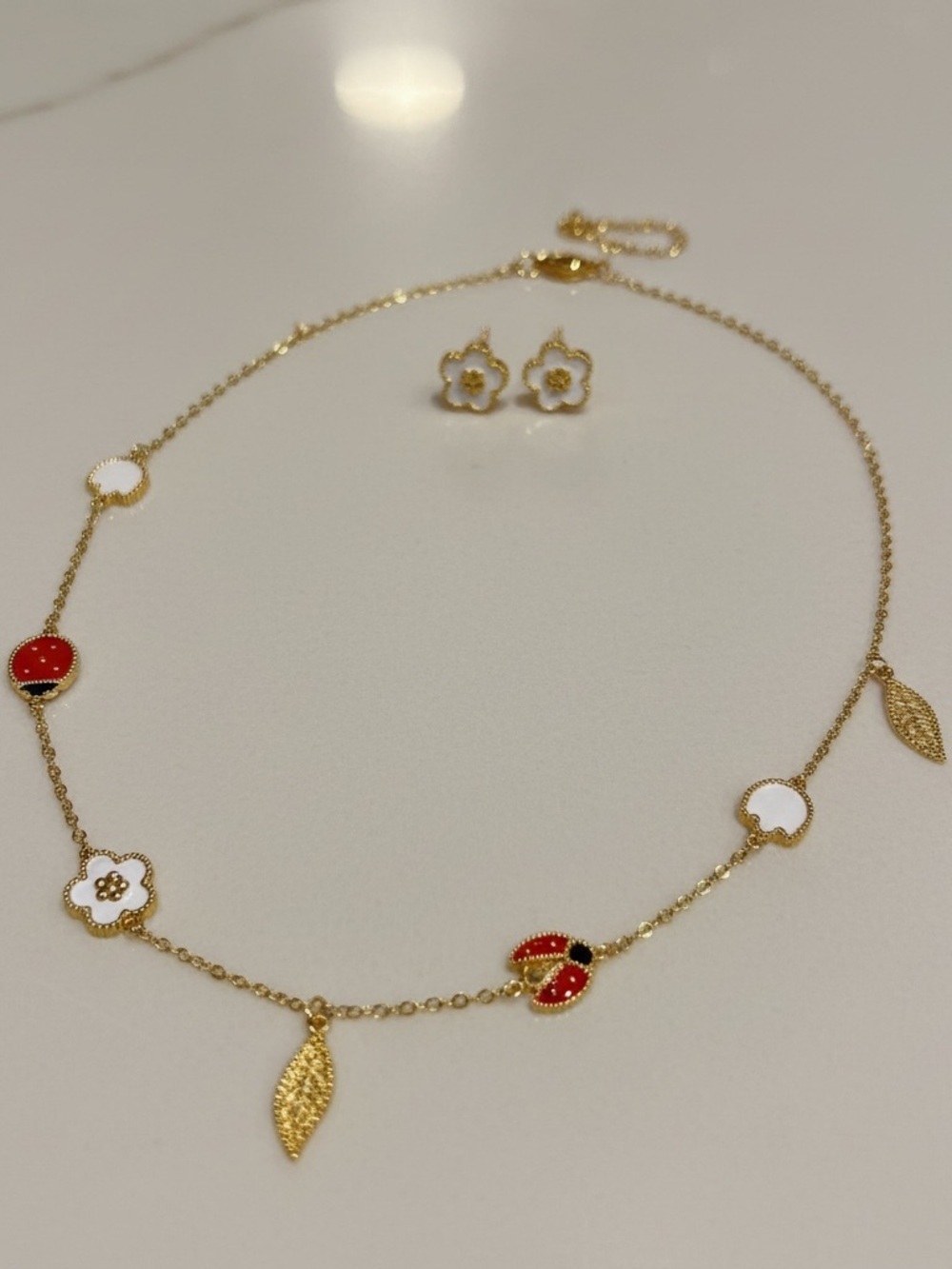 Gold-Tone Red & White Floral Charm Necklace with Matching Earrings